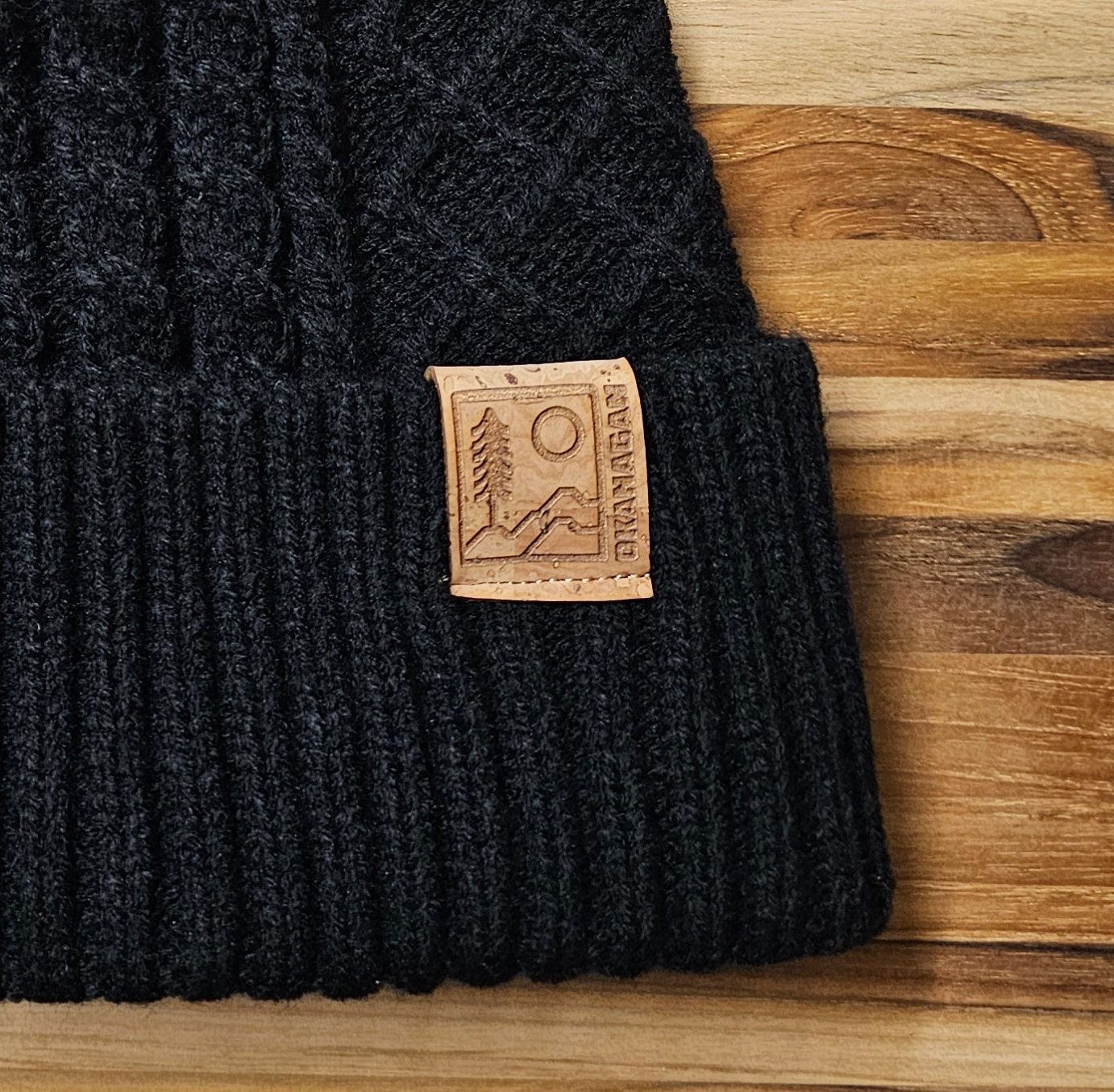 Okanagan Wild Cable Knit Toque with Faux Fur Pom and Cork Patch - Black
