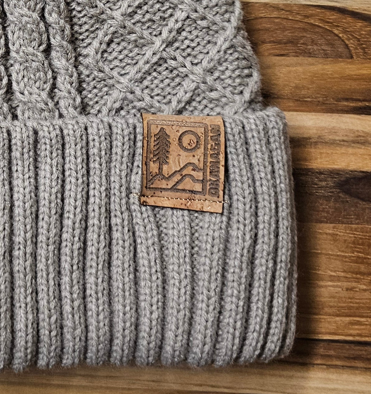 Okanagan Wild Cable Knit Toque with Faux Fur Pom and Cork Patch - Oatmeal