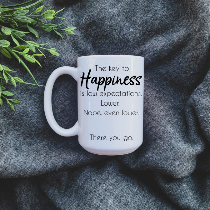 The Key To Happiness Mug