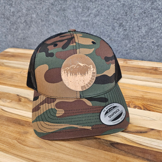 Okanagan Moon Cork Patch Camo Trucker Hat (Green Camo)