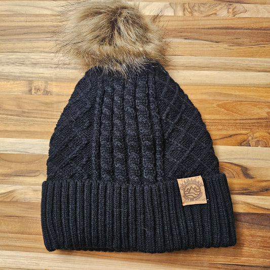 Okanagan Wave Cable Knit Toque with Faux Fur Pom and Cork Patch
